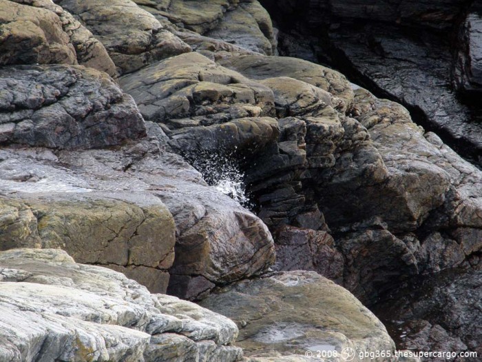 Water splash over the rocks