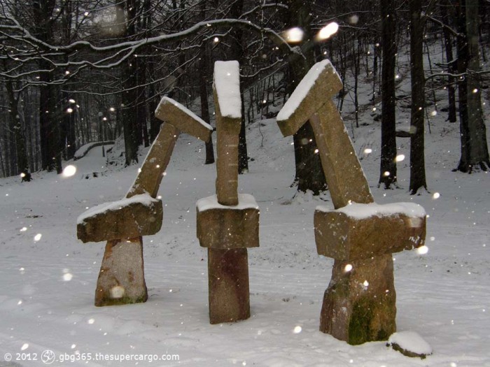 Sculpture The Three Graces in Keiller's park. Falling snowflakes caught in the flash