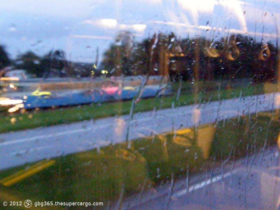 Through a rainy bus window near Eketrägatan