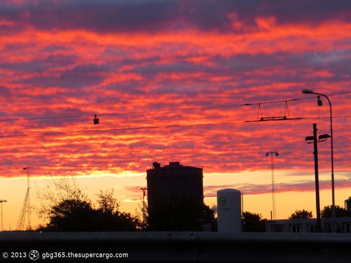 Sunrise over gasometers