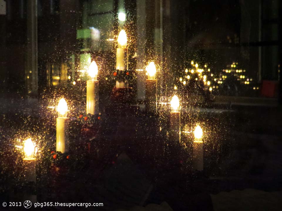 Lights behind a rainy window